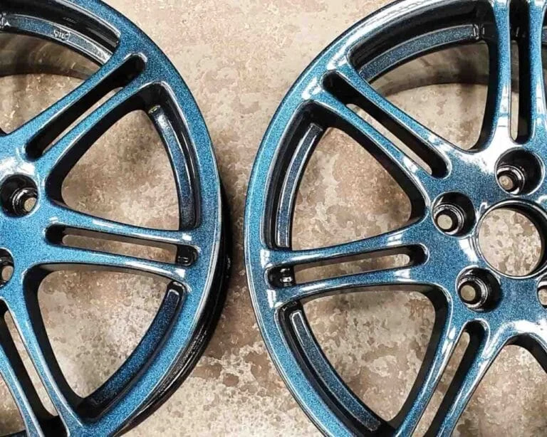 Custom turquoise star alloy wheel powder coating — Wheel Repair Manchester
